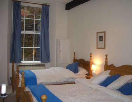 Riverside Cottage Bedroom two one single and one double.